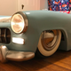 Illustration for article titled GM Clay Sculptor Buys The Shittiest Car In The Junkyard And Turns It Into His Sons Bed